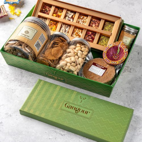 Gangour green Guilt Free Hamper with dry fruits, sweets, snacks, and festive décor